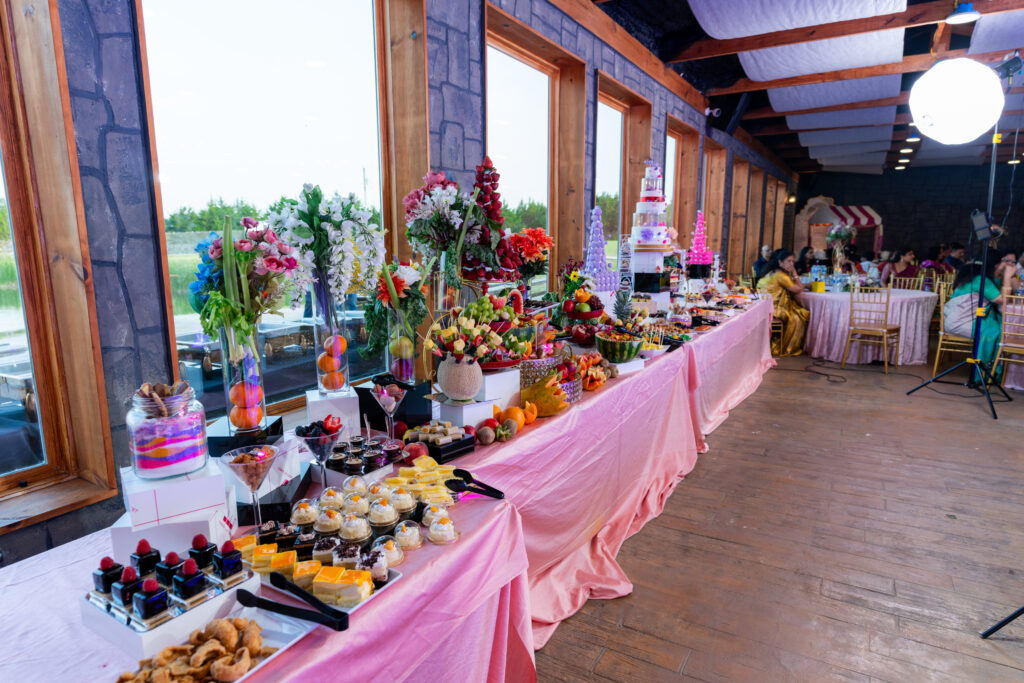 Lavish wedding dessert and fruit table setup at The Castle Waterford reception hall