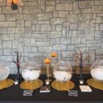 Candy bar setup with jars and decorative display at Castle Waterford wedding event