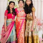 Women in traditional Indian wedding attire posing together at Castle Waterford celebration