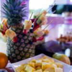 Fruit display with pineapple centerpiece and fresh cut fruits at Castle Waterford event