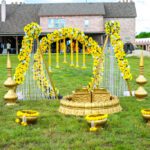 Haldi ceremony setup with yellow floral décor and traditional seating arrangement at Castle Waterford