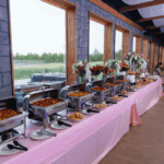 Wedding buffet with chafing dishes and hot food setup at Castle Waterford reception
