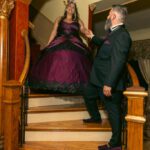 Couple on staircase in formal attire during wedding celebration at Castle Waterford